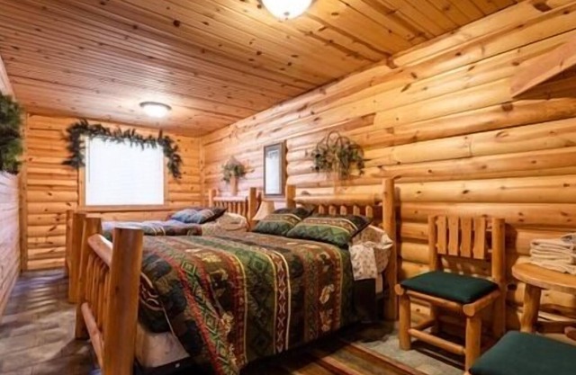 Shared bunkhouse with individual private rooms with separate toilets and showers for men and women