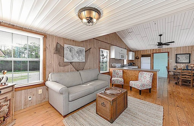 Shipwrecked Shack Waterfront House Boat on Land