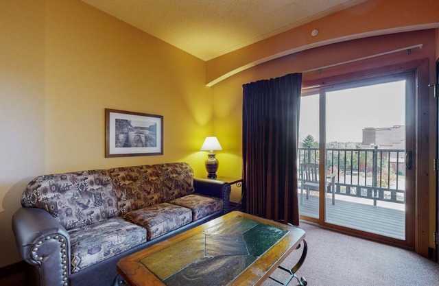 Side-by-side condos with in-room Jacuzzi, two fireplaces, & full kitchen