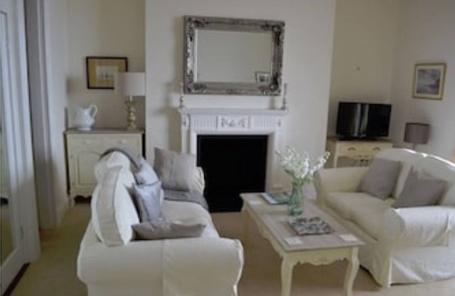 Sidmouth seafront apartment, just yards from beach, tastefully furnished.