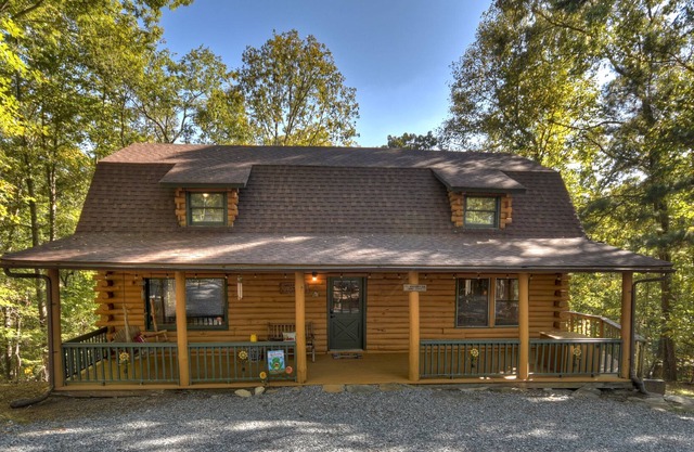 Simpler Times is a real log cabin with kids game room and firepit.