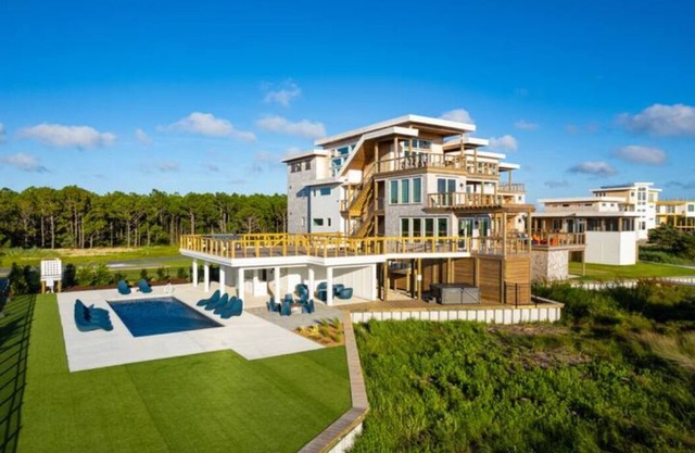 Simply the Finest - New Modern Waterfront Home w/ Saltwater Pool