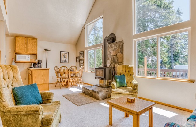 Ski-in/out dog-friendly home with deck, wood fireplace, grill & partial mtn view