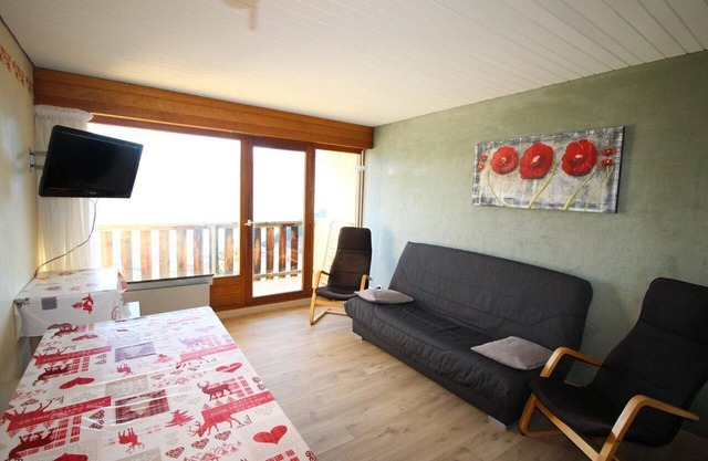 Au pied des commerces, 3ème étage, vue montagne, balcon, télévision, casier à ski, 55m²