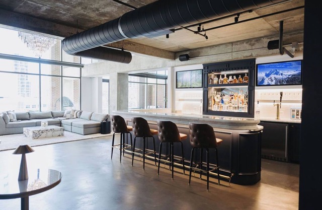 Sleek and Spacious Executive Loft with Full Bar, Theater Room, Fitness Room