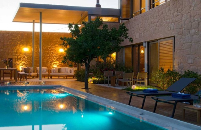 Sleek Stone House With Swimming Pool