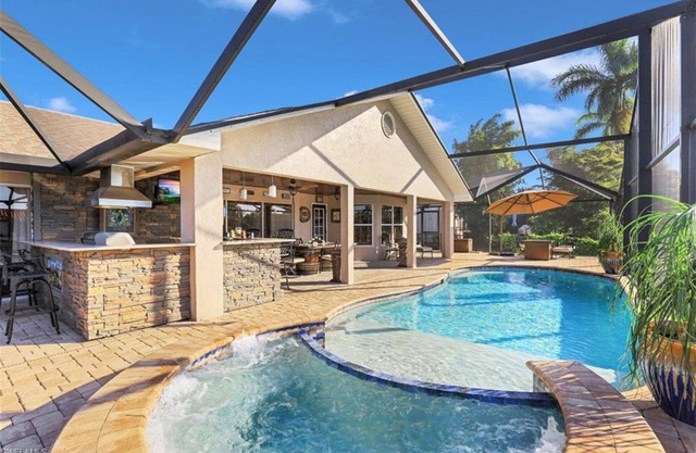 Southern Exposure with a Heated Pool/Spa, Standup Arcade on a Gulf Access Canal
