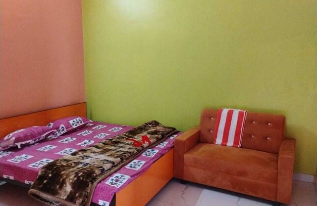 Spacious 18-Bedroom Retreat in Sacred Ayodhya, Embraced by Comfort and Serenity.