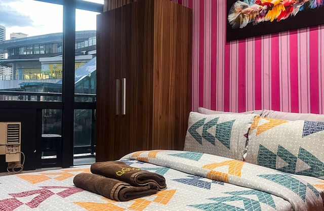 Spacious 3-bedroom apartment with WiFi, fitness room in vibrant Makati