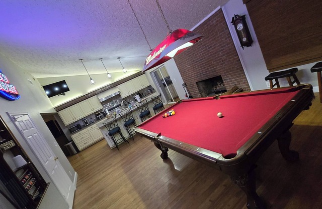 Spacious 4-bedroom house w/ gym, pool, WiFi, 8 miles from Ft. Bennings back gate