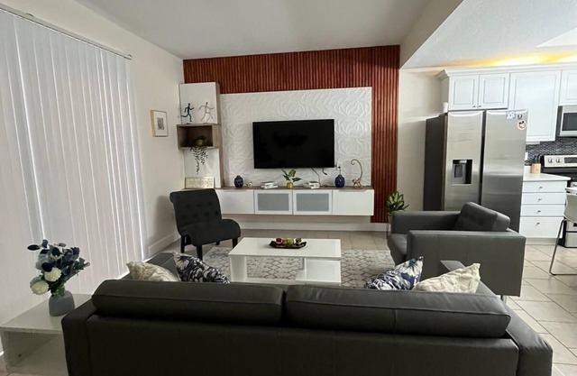 Spacious 4 bedroom townhouse with a heated communal pool.