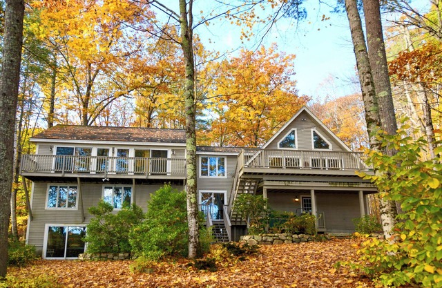 Spacious 5 Bedroom Home on Moose Pond with Sandy Beach and Dock!