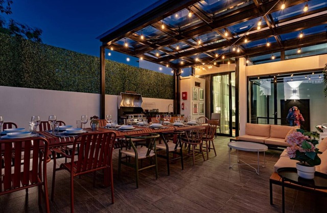 Spacious 6BR Retreat with Rooftop Terrace, BBQ & Gym Access