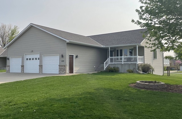 Charming small town 5-bedroom walkout home on corner lot..