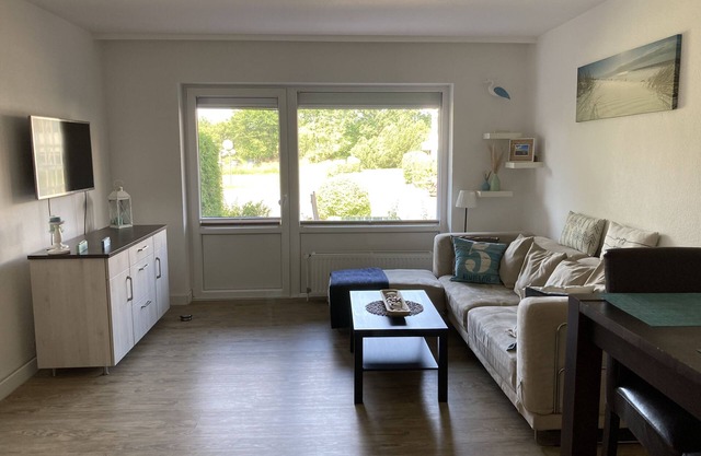 Appartement de plage spacieux dans un endroit calme avec piscine et sauna