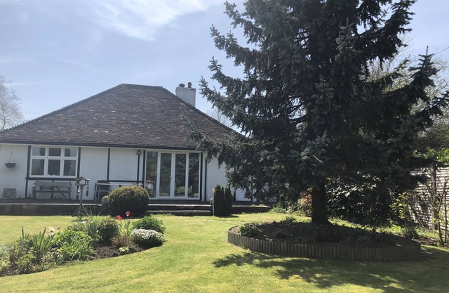 Chalet spacieux avec beau jardin et vue