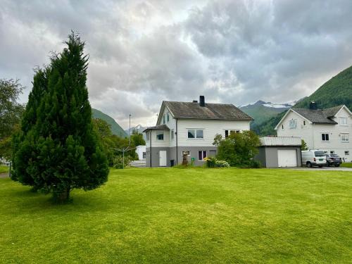 Spacious holiday home by the fjord and mountains