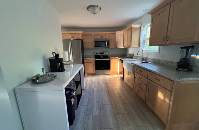 Spacious home near grocery store, interstate, etc, but also away from the crowd.