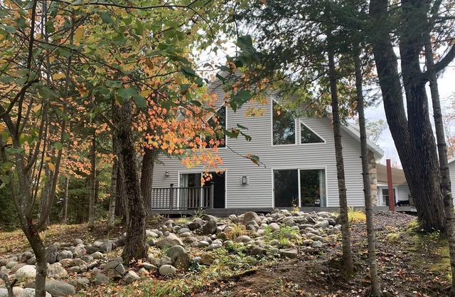 Spacious home on 5 acres with wonderful view of the river.
