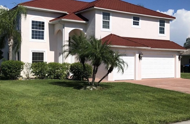 Spacious home with heated pool, and modern amenities.