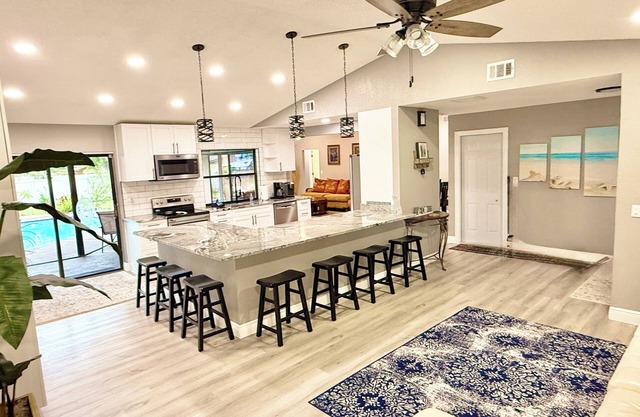 SPACIOUS home with private HEATED POOL 5 mins to beach! Close to everything!