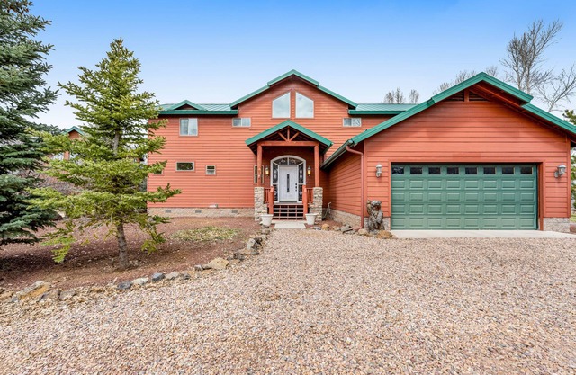 Spacious lakefront home with deck, private dock, & W/D