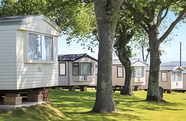 Spacious modern caravan with one double and two twin.