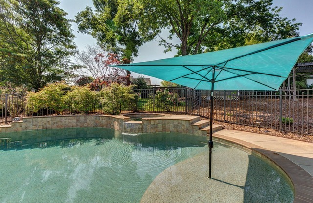 Spacious Oasis with heated pool/spa, covered patio, office & near Lake Norman