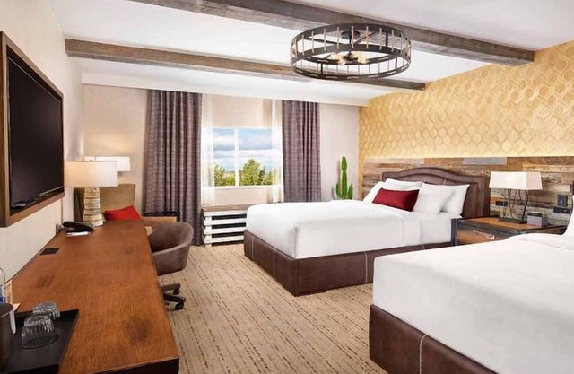 Spacious Room with Two Queen Beds and Stunning Poolside Views