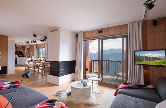 Duplex spacieux ski aux pieds avec vue imprenable