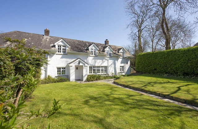 Sparnal Stitch nestled within the trees, just moments from sandy beaches