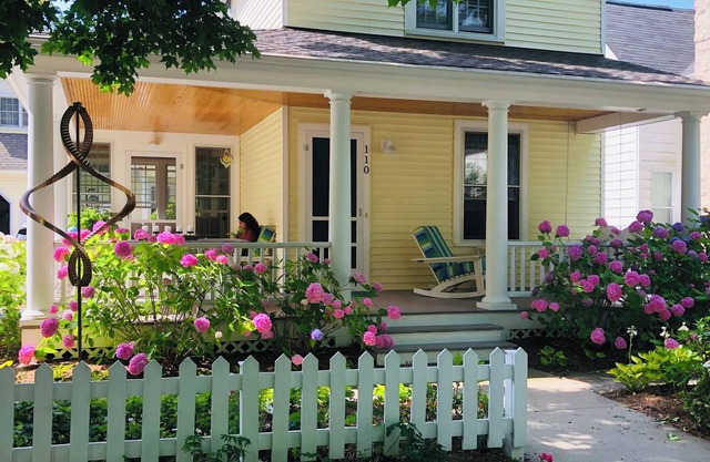 Spectacular home with wrap around porch and garden just steps from the beach