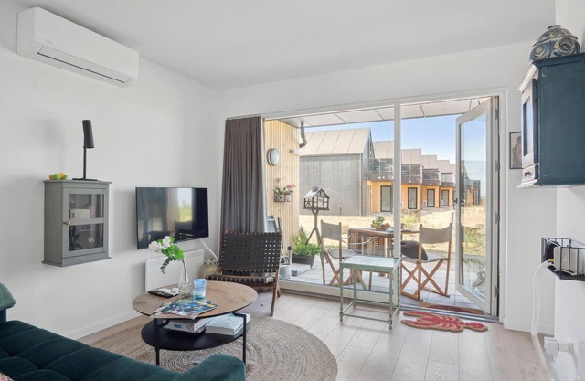 Spend your next waterfront vacation in this supremely comfortable home.