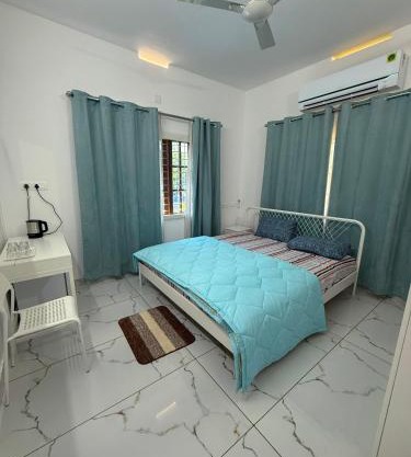 SRI Villa Rooms in Wayanad - Family Villa Stay with Mountain views