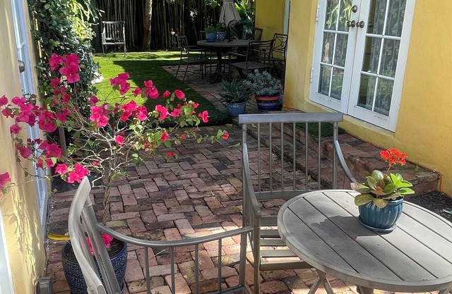 Historical charmer steps to waterfront and parks with shaded serenity garden.