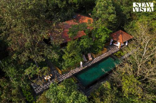 StayVista at The Forest Echoes with Pool, BBQ