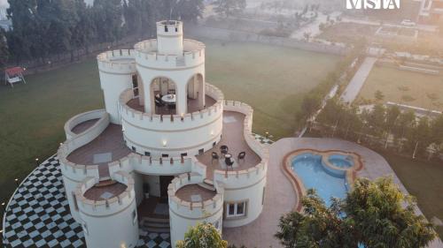 StayVista's Mystic Castle with Terrace, Swimming Pool, Lawn with Gazebo