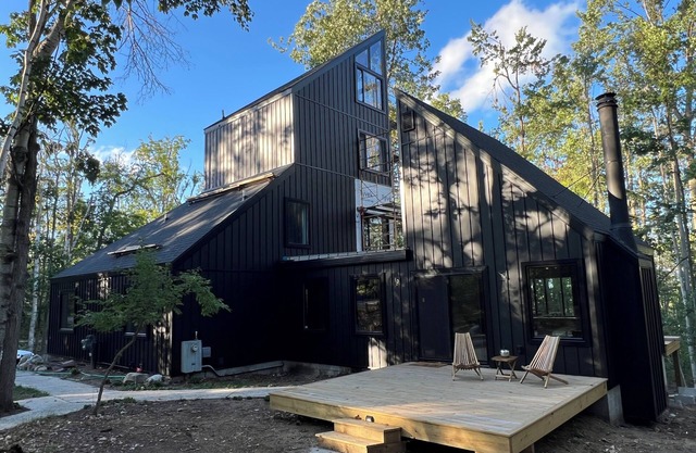 Step into Time Capsule Tower, a retro 70s escape with 5 themed bedrooms, movie room, hot tub, sauna, arcade & more. Centrally located near Northern Michigan golf, lakes, skiing, & off-road and snowmobile trails with access to a community pool.