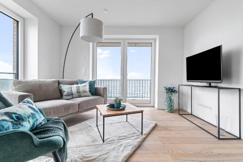 Strandfeder – Moderne Ostsee-Ferienwohnung für Drei im OstseeResort Olpenitz