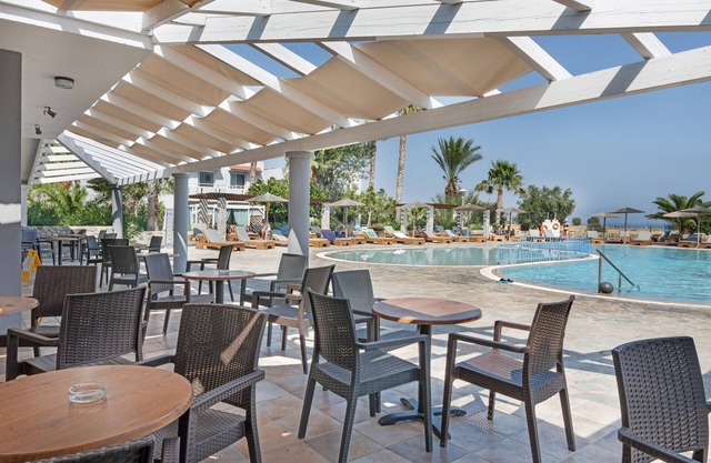 Studio 'Evripides Triple Room 1' avec piscine partagée, jardin partagé et climatisation