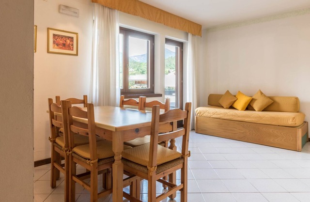 Studio Apartment Residence Comano Quadrifoglio 1 with Mountain View, Wi-Fi & Terrace; Parking Available, Pets Allowed