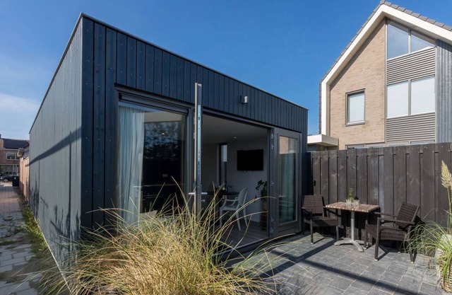 Maison de vacances au milieu d'une station