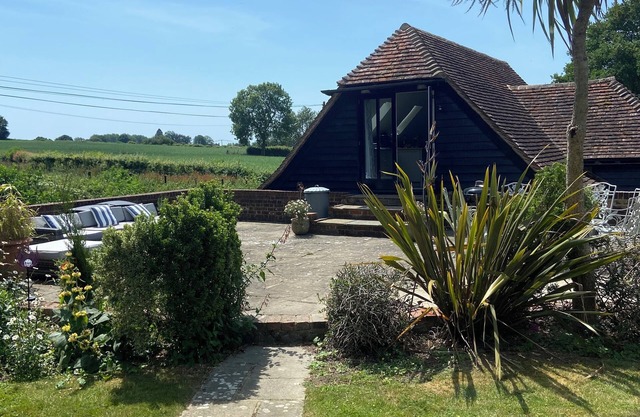Studio in mature English gardens in an area of outstanding natural beauty