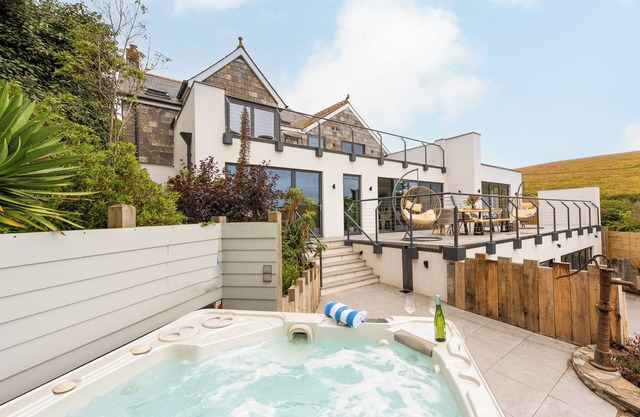 Stunning 5 star family home by the beach with hot tub, cinema den, & games room