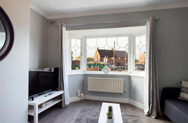 Stunning Family Home with Comfortable Surroundings by Our Home Short Stays ideally situated within Greater Manchester