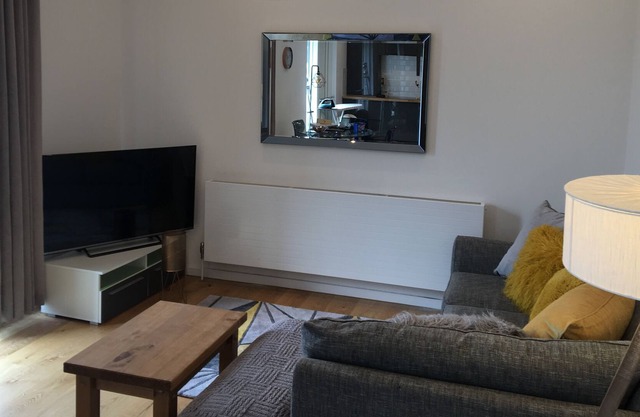 Superbe haut plafond ouvert appartement de luxe de 2 chambres prévu pour 5 personnes