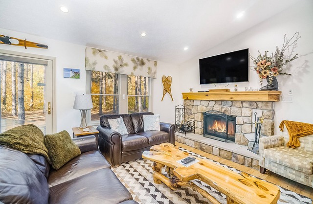 Superbe maison face au terrain de golf avec terrasse privée, hamac et foyer!