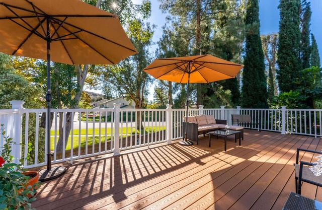 STUNNING HOME WITH SPA, FRONT AND BACK YARD, HUGE DECK, OUTSTANDING LOCATION