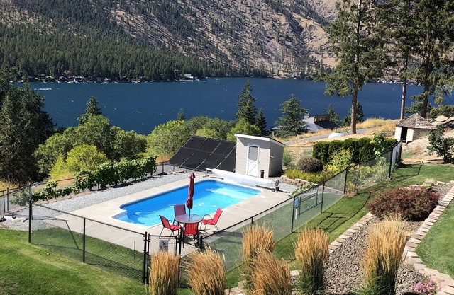 Stunning lake and mountain view home with seasonal private pool May-October.