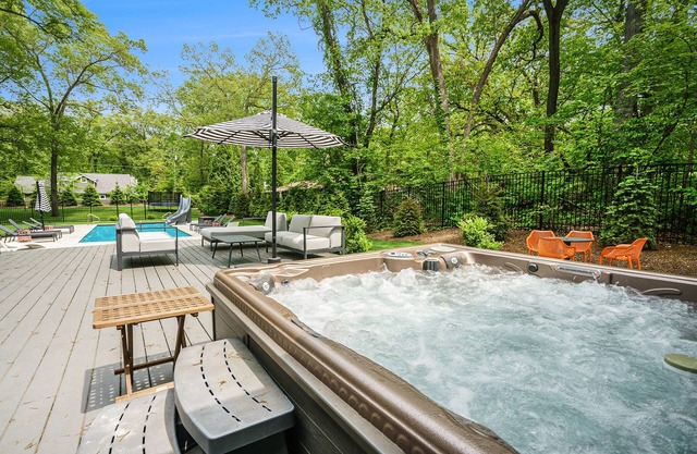 Stunning lake retreat with private pool, hot tub, games, firepit, & lovely patio